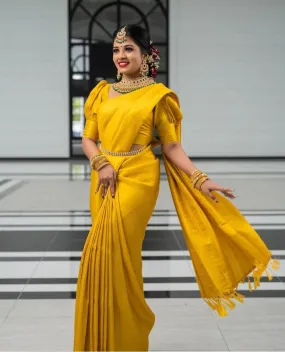 Bewitching Yellow Soft Silk Saree with Energetic Blouse Piece