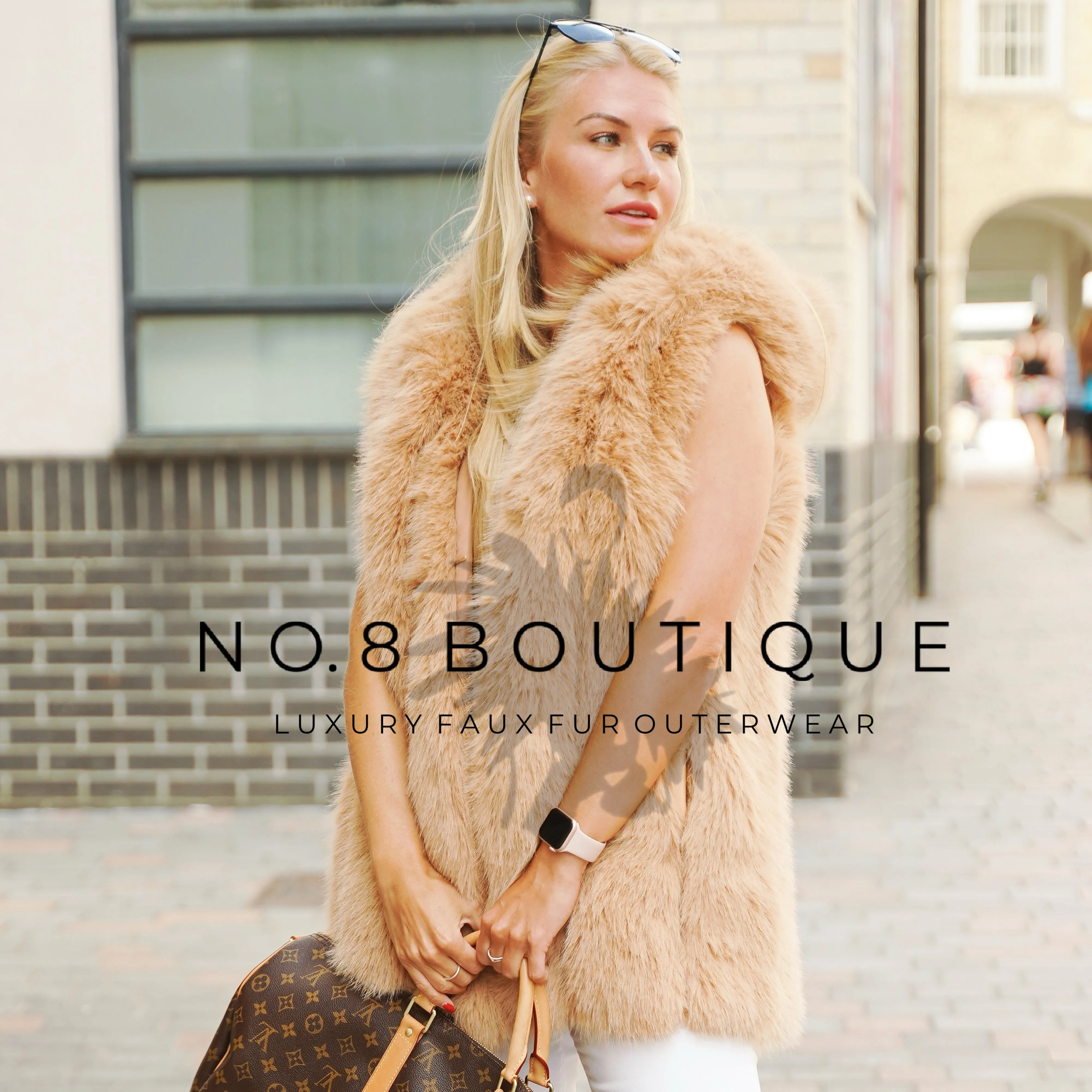 Vienna Hooded Straight Row Faux Fur Gilet